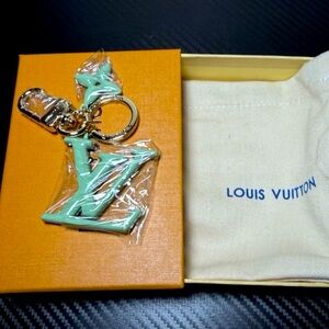 Louis Vuitton Pastel Green Keychain with Gold Accents